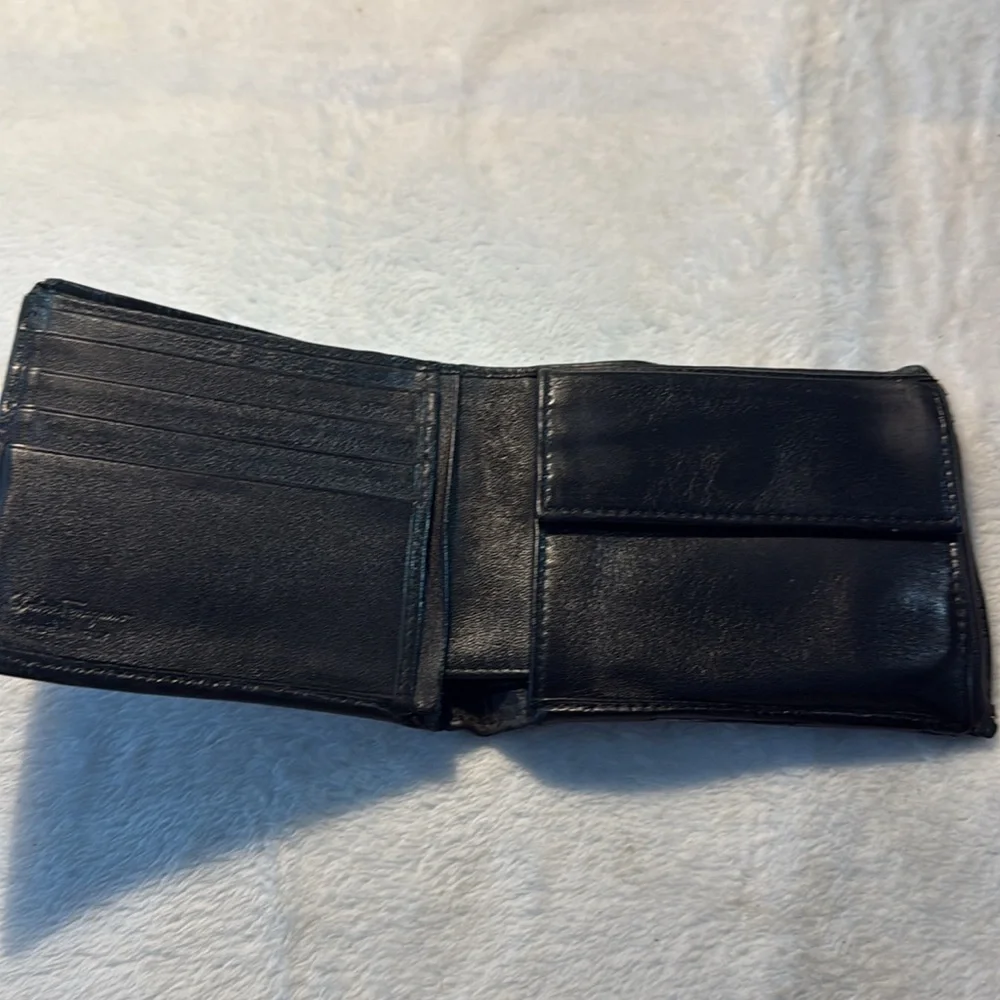 Salvador Ferragamo black bifold wallet.
